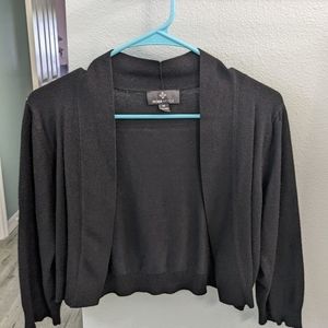 Black shrug sweater by Ronni Nicole